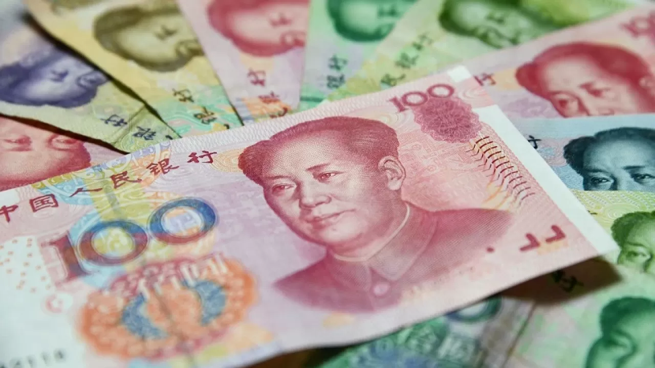 Доля юаня в международных расчетах выросла до рекорда  