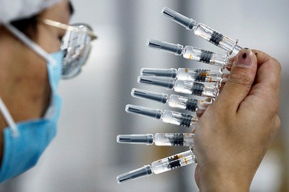 Қытай билігі жаздың ортасына дейін 548 миллион адамға вакцина егеді
